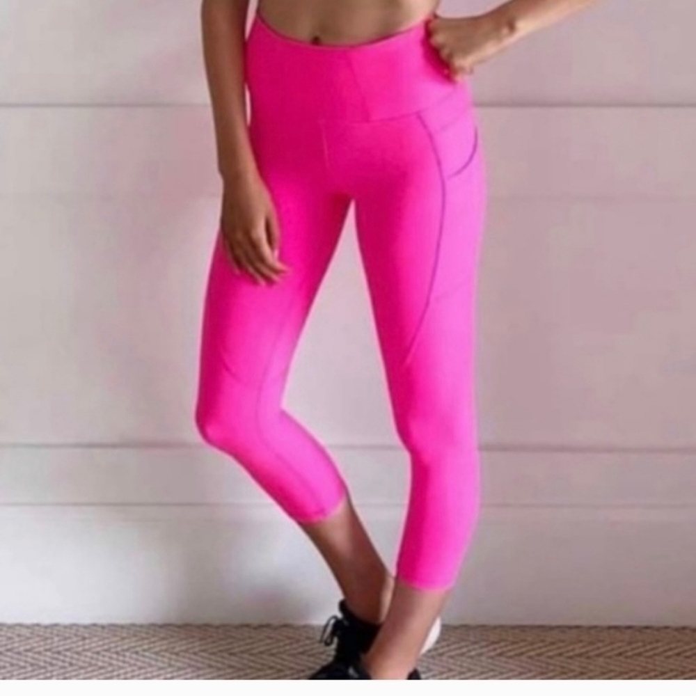 ZYIA•Party pink pocket Light n' Tight leggings